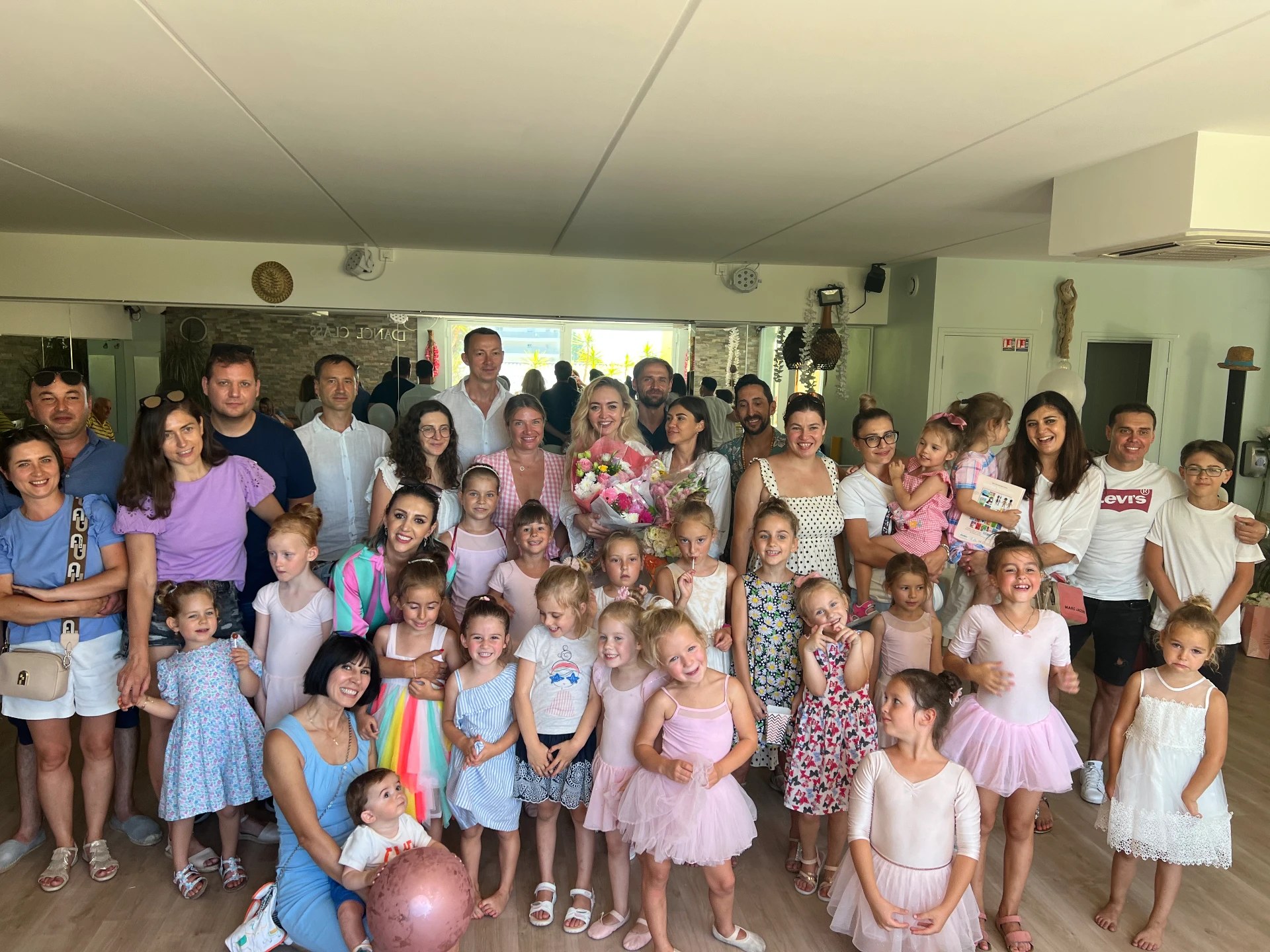 Tatiana Samoshkina with her students and their families after an end-of-year dance performance in Nice