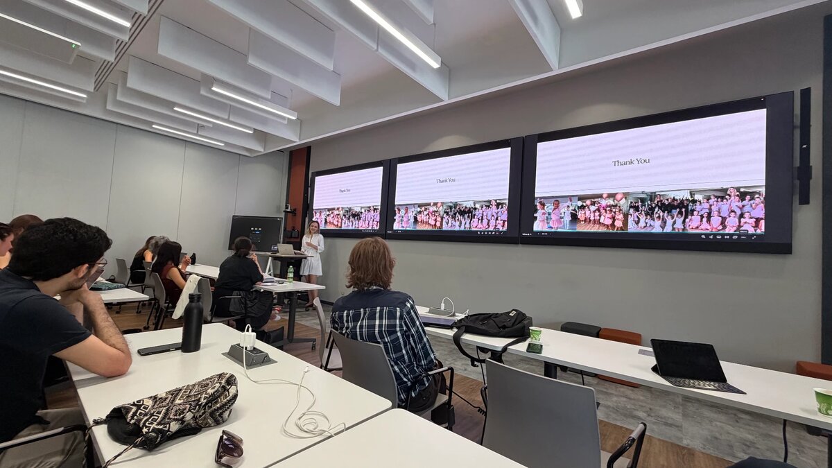 Tatiana Samoshkina speaking to an audience at a presentation