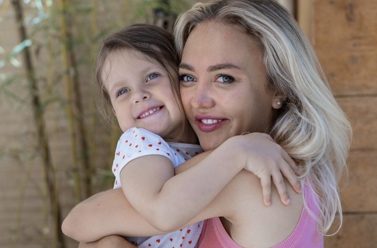 Tatiana Samoshkina hugging a young student on the French Riviera